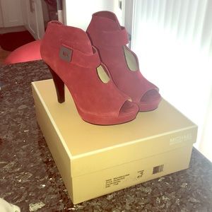 Good used condition red Michael Kors boots.